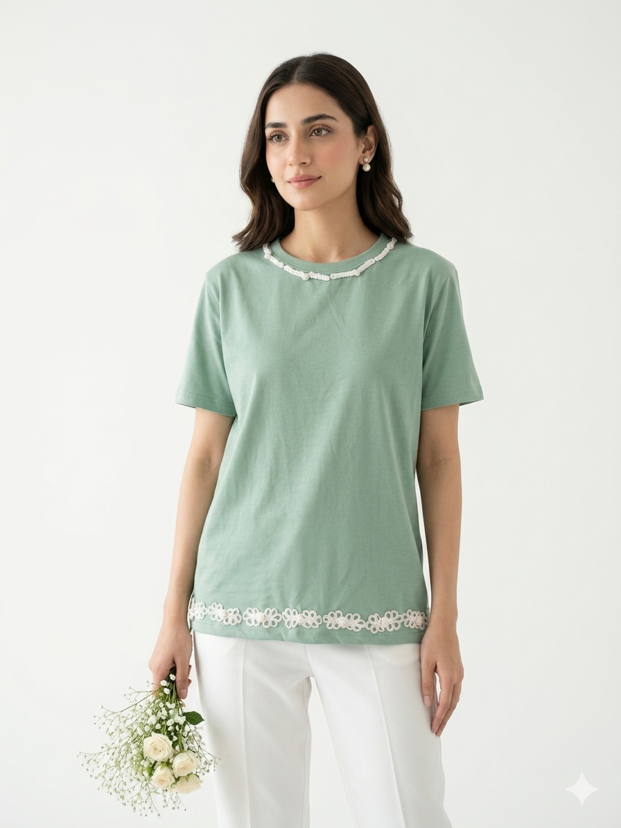 AI-generated product photoshoot for IZZ Habitus, sage green tee with floral trim